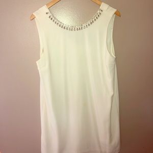 White dress with rhinestones around the neckline